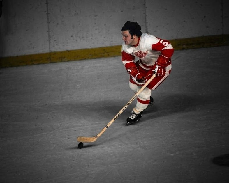 Marcel Dionne précommande: Photo autographiée 8x10 Red Wings de Detroit Spotlight en action